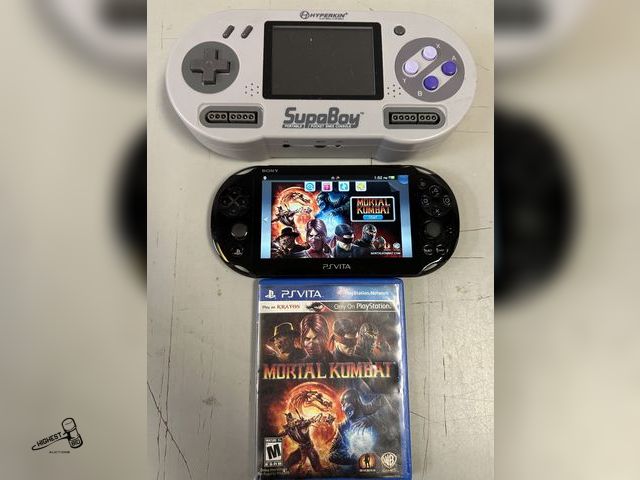 Lot 91-7801 - SONY PSVITA WITH MORTAL KOMBAT GAME - SUPABOY HANDHELD GAME