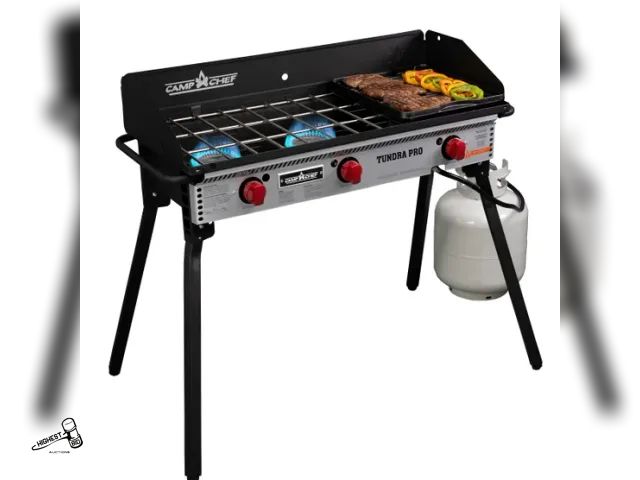 Lot 91-8953 - New MSRP$ 259.99 Camp Chef Tundra 3 Burner Stove with Griddle - 3ft. Hose and Regulator - Folding Le...