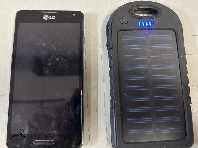 Lot 91-7792 - LG PHONE AND SOLAR POWER CHARGER POWER BANK
