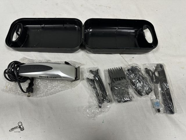 Lot 91-7676 - BROOKSTONE HAIR CLIPPER/TRIMMERS WITH ASSORTED GAURDS, COMB &amp; SCISSORS