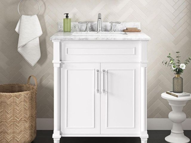 Lot 96-179097 - Home Decorators Collection
Aberdeen 30 in. Single Sink
White Bath Vanity with Carrara Marble Top (As...