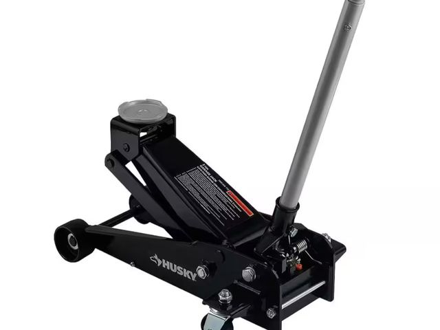 Lot 96-189221 - Husky 2 ton trolley jack used missing pole