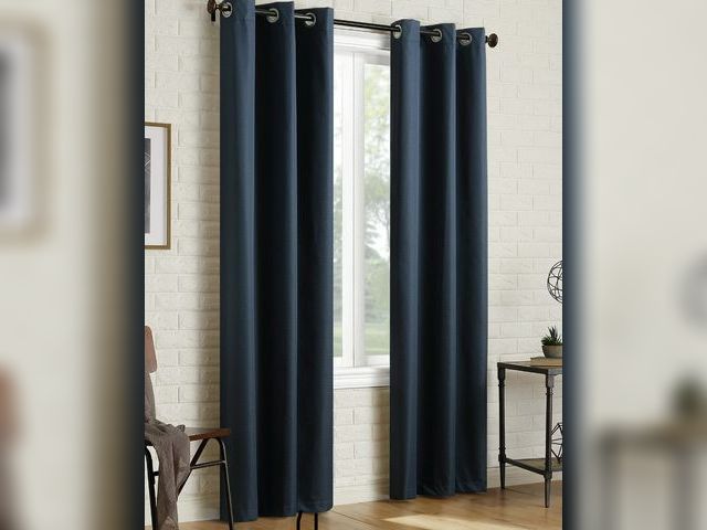 Lot 96-164431 - Sun Zero 2-pack Arlo Textured Thermal Insulated Grommet Curtain Panel Pair, 40" x 63" Navy
New, open...