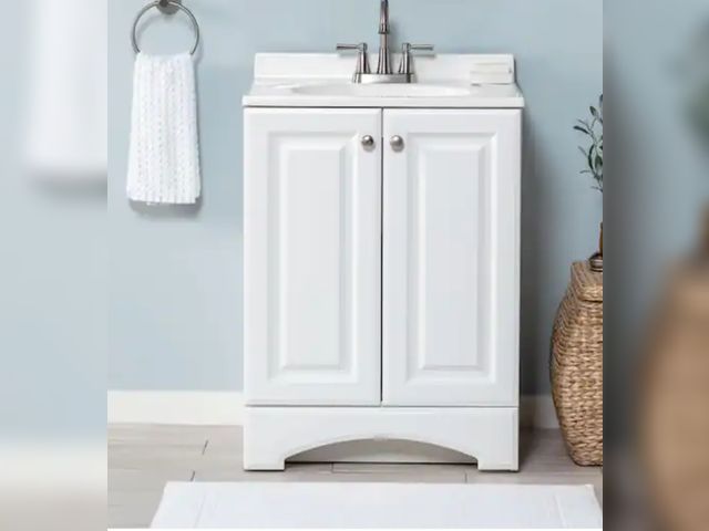 Lot 96-173618 - Glacier Bay 25 in. Single Sink White Bath Vanity. Sink is broken. Cabinet appears good.