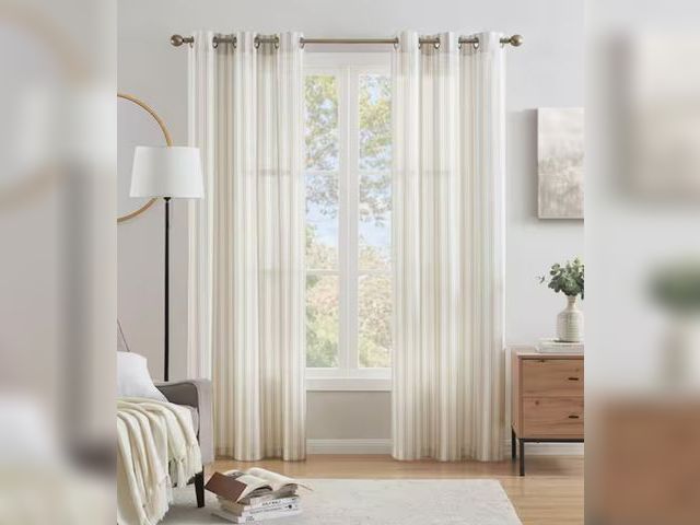 Lot 96-164154 - LiGHTSOUT with EnerShield Technology
Ticking Stripe Beige 38 in. W x 84 in. Grommet Light Filtering ...
