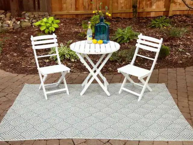 Lot 96-232740 - Momeni Como Blue 9 ft. 10 in. X 13 ft. 2 in. Indoor/Outdoor Area Rug New  Msrp $303.80