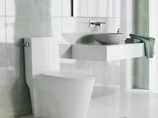 Lot 96-167269 - Swiss Madison St. Tropez 1-Piece 1.28 GPF Single Flush Elongated Toilet in White Seat Included MSRP ...