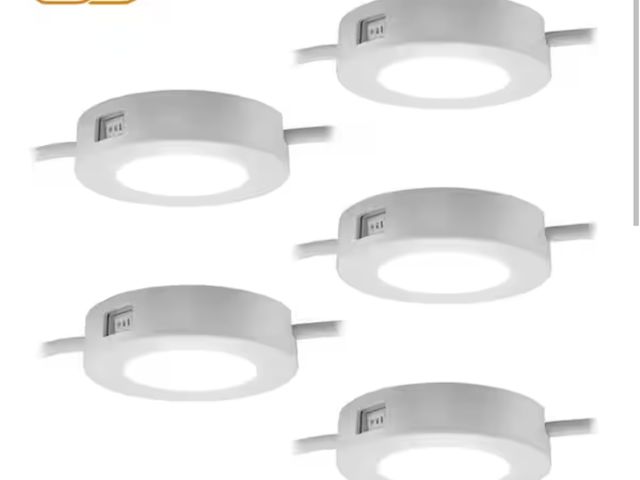 Lot 96-174649 - ULTRA PROGRADE 
ProLink Plug-in LED Under Cabinet Puck Lights (5-Pack) open box, Unused