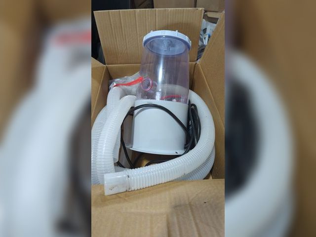 Lot 96-159322 - Appears to be a pool or spa filter pump, or possibly a component of a larger water filtration system...