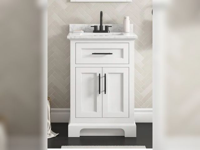 Lot 96-226331 - Home Decorators Collection
Doveton 24 in. Single Sink Freestanding White Bath Vanity with White Engi...