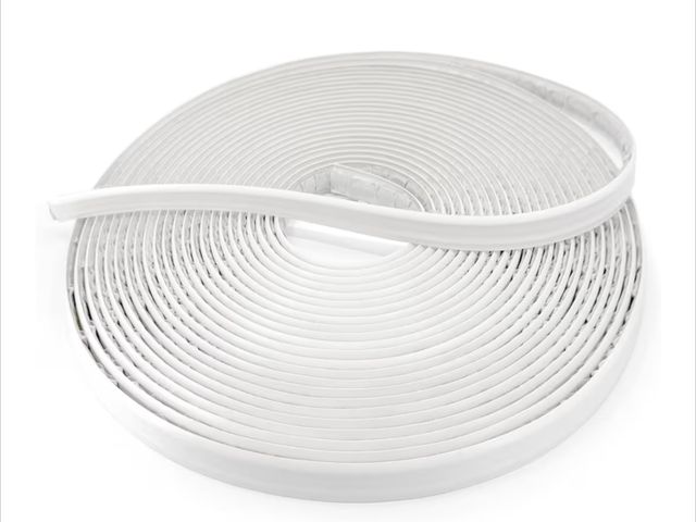 Lot 96-181444 - White Plastic Trim with Many Uses Including Caulking for Bathtubs, Sinks, Counters, Tile, Floors Unu...