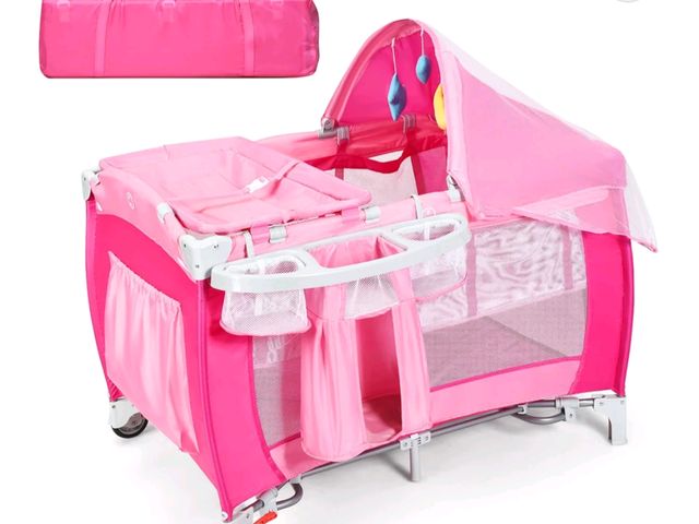 Lot 96-227162 - Costway Foldable Baby Crib Playpen Travel Infant Flat Bassinet Bed Mosquito Net Music with Bag Pink
...