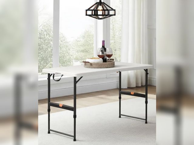 Lot 96-211411 - HDX
4 ft. Almond Resin Top Single Hand Adjustable Height Rectangular Folding Utility Table, Seats- 4...