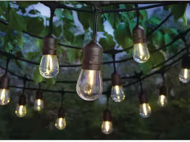 Lot 96-162609 - 24-Light 48 ft. Plug-in Indoor/Outdoor Edison Patio String Light with S14 Single Filament LED Bulbs
...