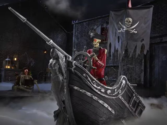 Lot 96-232393 - Home Accents Holiday 9.5 FT Dead Water Giant-Sized Animated LED Pirate Ship MSRP $399