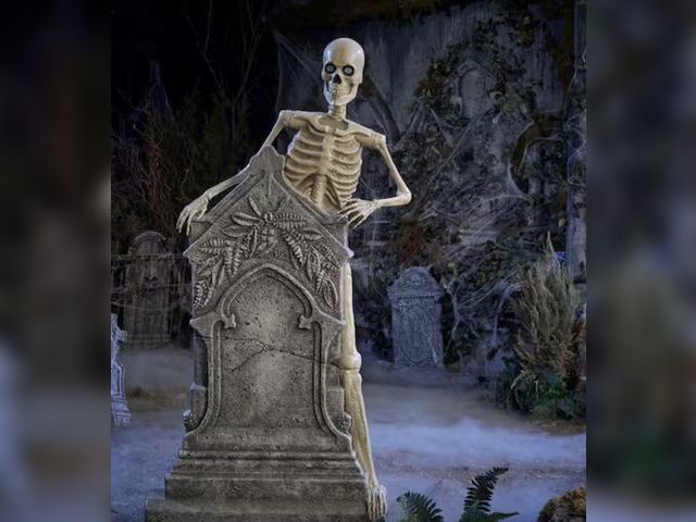 Lot 96-232286 - Home Accents Holiday 5FT Skelly Tombstone New MSRP $149