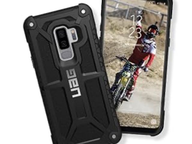 Lot 96-230670 - Urban Armor Gear Monarch Pro case features a rugged black carbon fiber design built for a future 6.9...