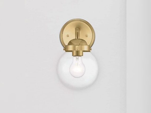 Lot 96-214351 - Designers Fountain
Knoll 5.75 in. 1-Light Brushed Gold Industrial Wall Sconce with Clear Glass Shade...