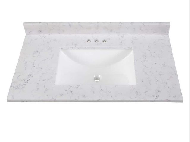 Lot 96-210972 - Home Decorators
Collection
37 in. W x 22 in. D Engineered Stone Composite White Rectangular Single S...