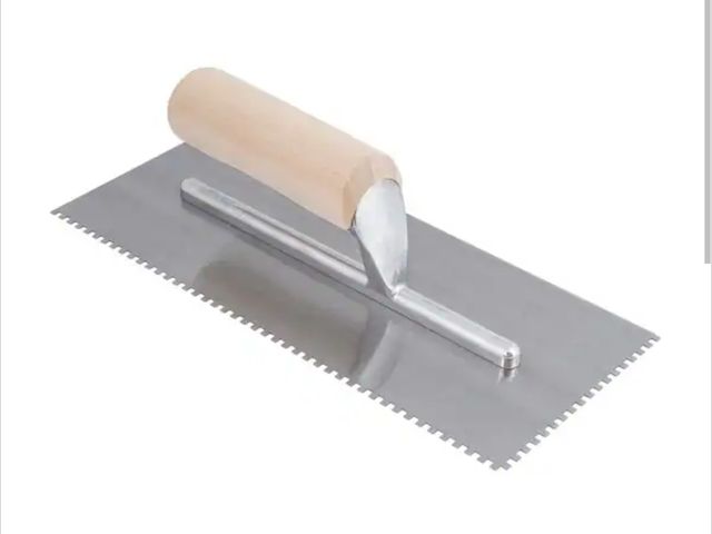 Lot 96-212033 - ROBERTS 1/8 in. x 1/8 in. x 1/8 in. Square Notch Pro Wood Flooring Trowel with Wood Handle New