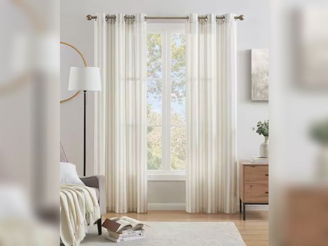 Lot 96-162046 - LiGHTSOUT with EnerShield Technology
Ticking Stripe Beige 38 in. W x 84 in. Grommet Light Filtering ...