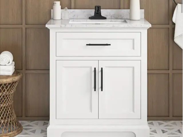 Lot 96-190446 - Home Decorators Collection
Doveton 30 in. Single SinkFreestanding White Bath Vanity with White Engin...
