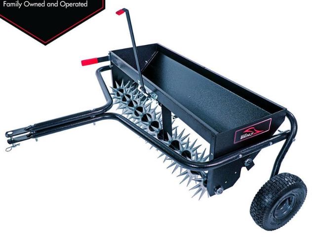 Lot 96-155828 - Brinly-Hardy 40 in. Tow-Behind Combination Aerator Spreader with 3-D Steel Tines and Pneumatic Tires...