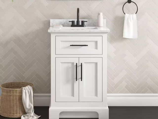 Lot 96-182119 - Home Decorators Collection
Doveton 24 in. Single Sink Freestanding White Bath Vanity with White Engi...