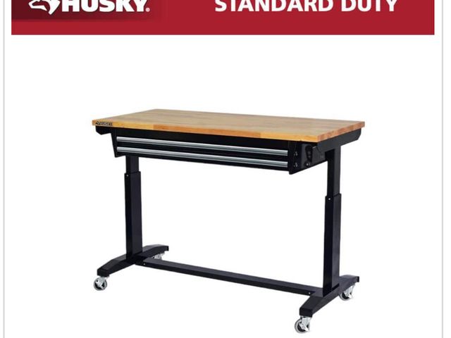 Lot 96-184090 - Husky 52 in. W x 24 in. D 2-Drawer Adjustable Height Blaxk Work Table with Solid Wood Top MSRP $329 ...