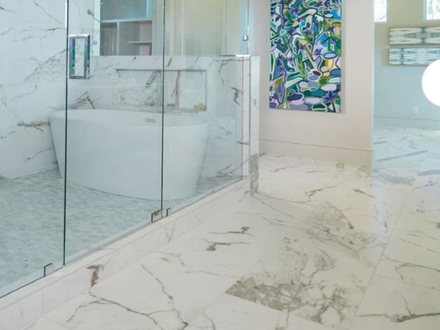 Lot 96-226118 - Approximately 325 ft² Daltile Marble Attache 24" x 48" Rectified Matte Porcelain Floor Tile. 5 Boxes...