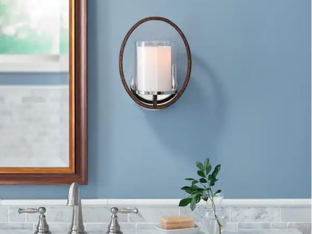 Lot 96-174515 - Home Decorators Collection
Downing 1-Light Polished Nickel/Corona Bronze Wall Sconce
New