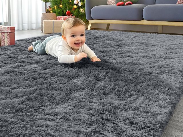 Lot 96-189960 - Grey shag area rug approx 5x7’ Unused