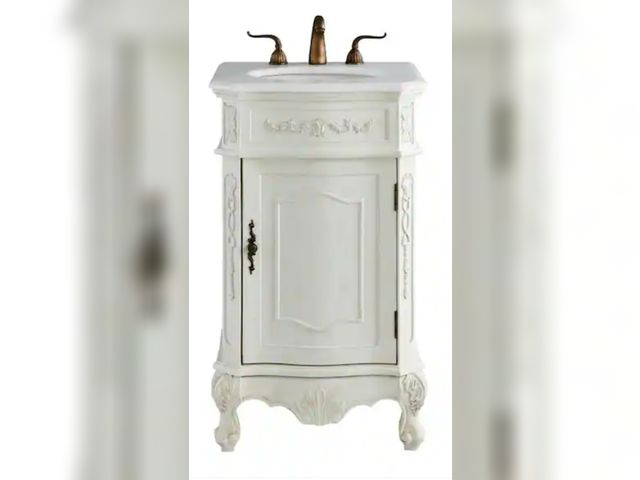 Lot 96-211424 - Simply Living 21 in. Single Sink Antique White Bath Vanity with Ivory White Engineered Marble Top.
N...
