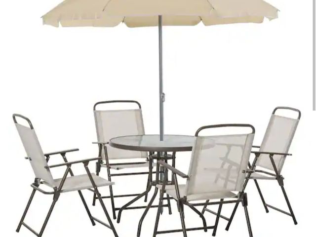 Lot 96-214272 - 6-Piece Metal Round Outdoor Dining Furniture Set and Umbrella with 4-Folding Dining Chairs and Glass...