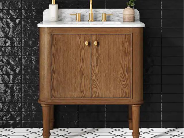 Lot 96-173609 - Home Decorators Collection
Collette 30 in. Single Sink Cinnamon Oak Bath Vanity with White Carrara M...