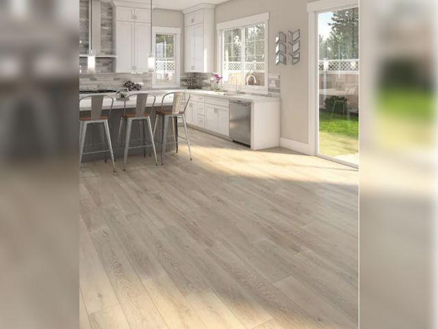 Lot 96-232242 - 621.40 sq ft of TrafficMaster Camden Lake Oak 7 mm T x 8 in. W Laminate Wood Flooring (23.9 sqft/cas...