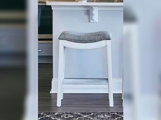 Lot 96-198902 - NewRidge Home Goods
Zoey 26 in. Farmhouse White Backless Wood Counter Stool with Gray Upholstered Sa...