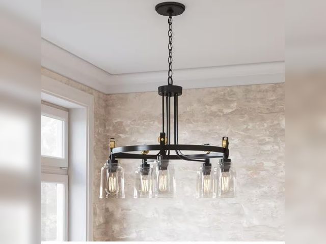 Lot 96-182605 - Home Decorators Collection
Knollwood 30 in. 5-Light Black Bronze with Brass Accents Industrial Round...