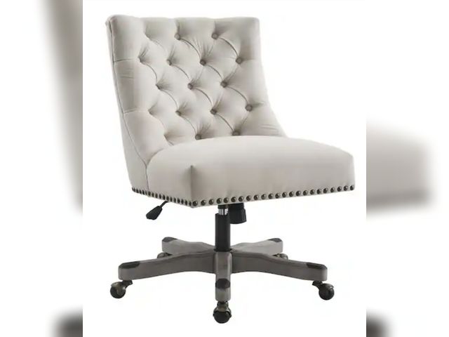 Lot 96-181896 - Linon Home Decor
Des Fabric Adjustable Height Swivel Office Desk Task Chair in Natural with Wheels
O...