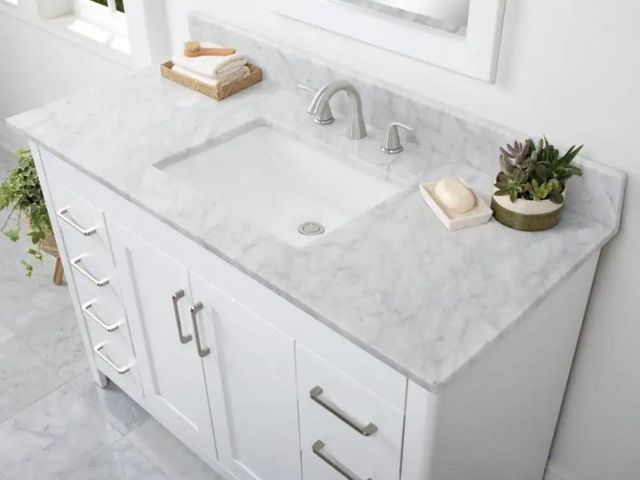 Lot 96-165432 - Home Decorators Collection
49 in. W x 22 in D Marble white Rectangular Single Sink Vanity Top in Car...