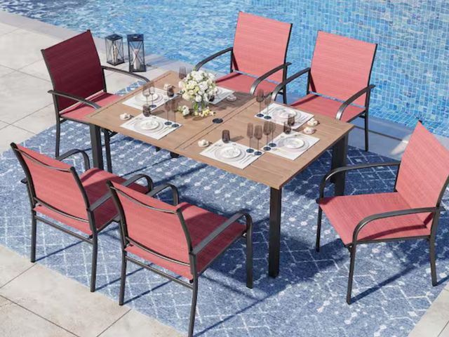 Lot 96-166446 - Black 7-Piece Metal Outdoor Patio Dining Set with Wood-Look Rectangle Table and Red Textilene Chairs...