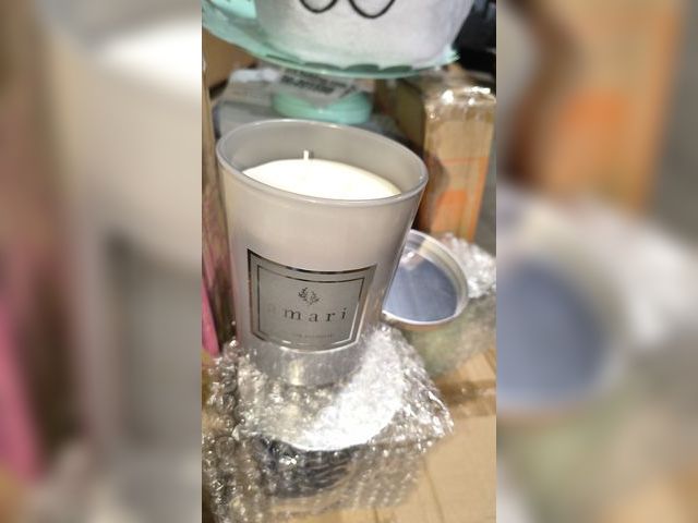 Lot 96-201614 - Amari Cotton Blossom Candle 
New