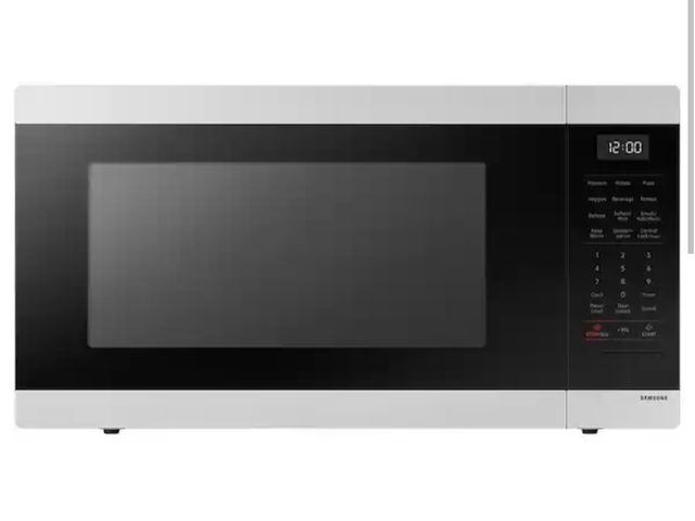 Lot 96-199232 - Samsung 1.9 cu. ft. 900 W Countertop Microwave in Stainless Steel with Sensor Cook Unused door appea...