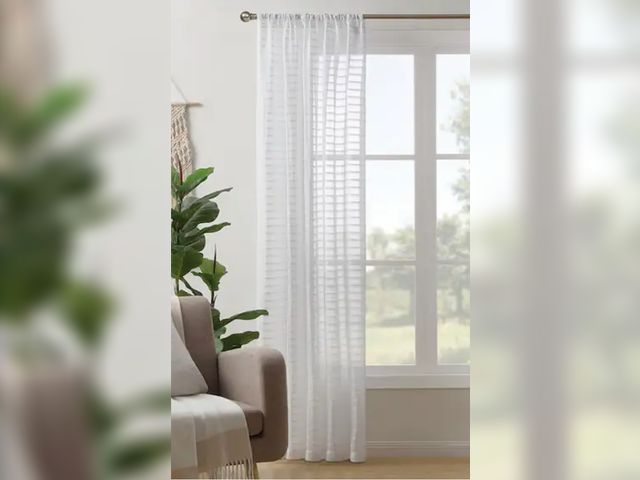 Lot 96-165127 - LiGHTSOUT with EnerShield Technology
Pleated Stripe White 52 in. W x 84 in. L Rod Pocket Sheer Curta...