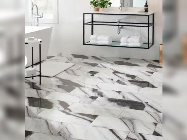 Lot 96-183093 - Approximately 171 ft² Daltile Rapport Panda Marble Polished 12 in. x 24 in. Glazed Porcelain Floor a...