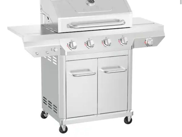 Lot 96-172974 - Nexgrill 4 Burner Stainless Steel Propane Gas Grill with Side Burner New , Has very minor ding See p...