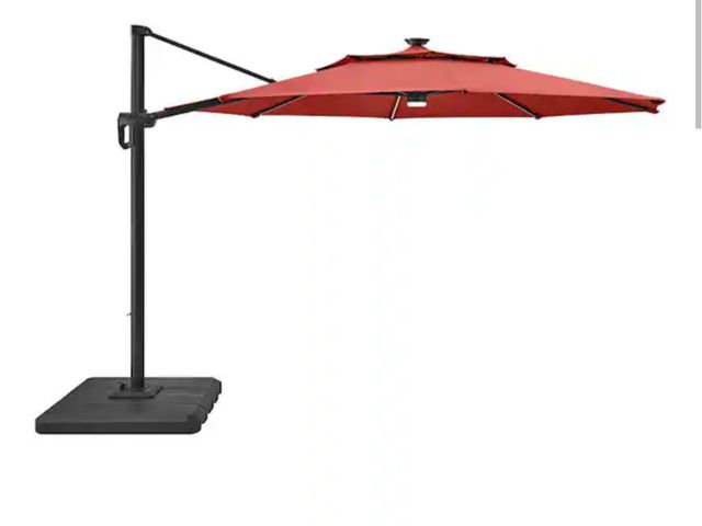 Lot 96-166565 - Hampton Bay 11 ft. Aluminum Cantilever Solar LED Offset Patio Umbrella in Chili Box Damage, one visi...