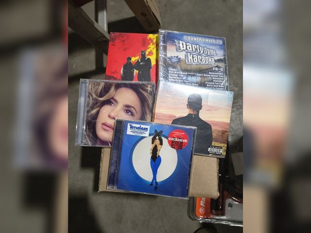 Lot 96-192135 - Lot of 5 CDs 
Clancy, Party Tyme Karaoke, Shakira, Justin Timberlake, &amp; Meghan Trainor 
New