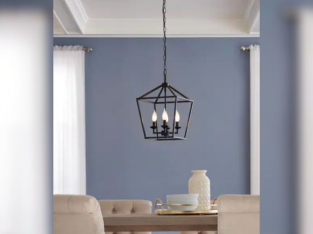 Lot 96-174521 - Home Decorators Collection
Weyburn 4-Light Bronze Farmhouse Chandelier Light Fixture with Caged Meta...