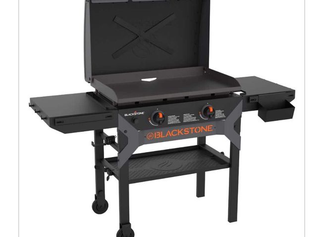 Lot 96-163138 - Blackstone 2-Burner Propane Outdoor Griddle with Hood in Black MSRP $391.58 New